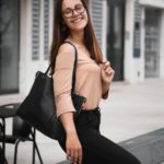 girl with black bag