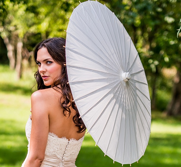 Bride with a wedding umbrella