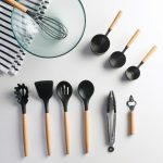 kitchen utensils with black and wooden design