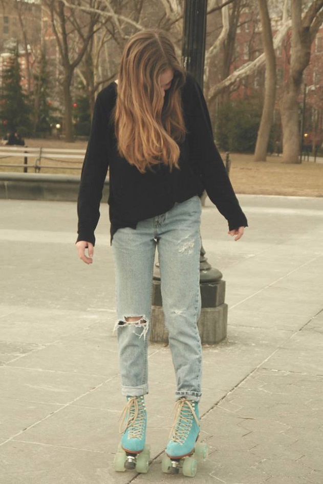 picture of a girl on roller skates in a park