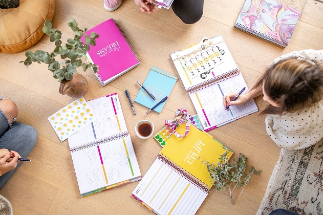 teacher writing on a teacher diary