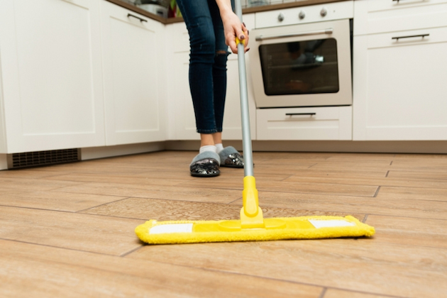 cleaning the kitchen floor