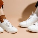 2 pairs of white sneakers